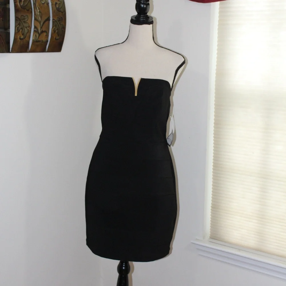 Emerald Sundae, body con strapless black dress. Large.....